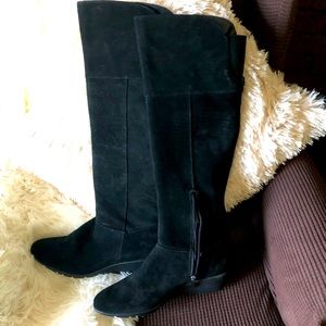 Black suede wedge knee boots.